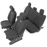 Rough Country front seat covers shown installed, protecting upholstery