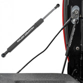 Rough Country front view of tailgate assist showing mount and damper for easy lowering