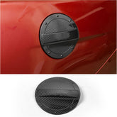RT-TCZ front view of fuel filler door cover showing sleek carbon-fiber look and fit