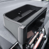 RUNROAD front-mounted dashboard tray installed showing neat storage benefit
