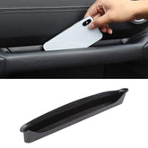 Savadicar front view of grab tray showing sleek black finish and compact shape benefiting storage