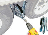 Schumaho front view of wheel chock kit showing components and compact storage benefit
