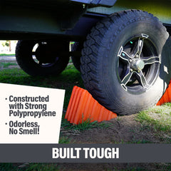 SECURITYMAN chock placed at RV tire demonstrating secure parking and ease of use