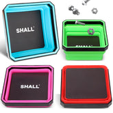 SHALL front view of four colored trays showing compact kit and organization benefit