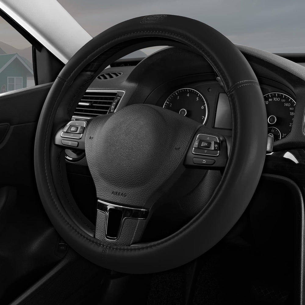 Skechers front view of steering wheel cover showing sleek black finish and fit