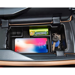 SKTU organizer holding sunglasses and coins for neat storage