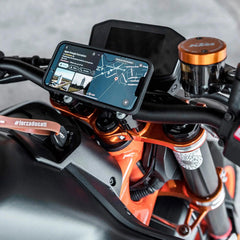 SP CONNECT spacing inserts next to mount demonstrating tailored handlebar fit