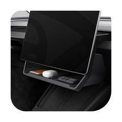 Spigen front installed under-screen tray in Tesla showing neat storage and easy access