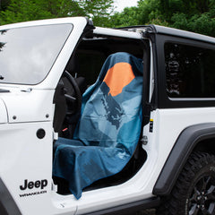 Sprints towel installed over car seat headrest demonstrating protection and anti-slip benefit