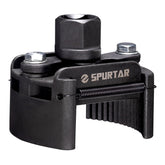 Spurtar front view of the wrench showing adjustable jaws and durable build for reliable removal