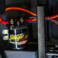STINGER SGP32 mounted in a vehicle under-hood showing reliable accessory charging