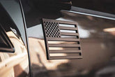 TACTILIAN badge front view showing matte black finish and patriotic style