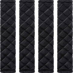 Tatuo front view of four black seat belt pads showing neat pack and style benefit