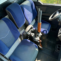 telfair installed under a Can Am Defender seat securing firearms and reducing clutter