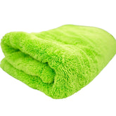 THE HOUSE OF RAGS THOR G.O.A.T. green towel folded, shows plush pile and easy handling benefit
