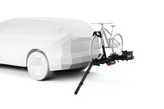 Thule ramp in use with e-bike illustrating safer rolling onto a Thule rack