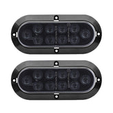 TMH 6-inch oval front view showing smoked lens and red LED glow for stylish visibility