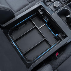 TOPINSTALL organizer front view showing fit and extra storage