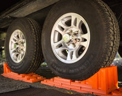 Tri-Lynx chocks in use against an RV tire for added stopping security