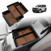 TripleAliners front view of brown console insert, neat compartment organization