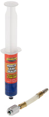 TSI Supercool syringe attached to HVAC service port demonstrating leak treatment