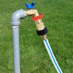 Valterra regulator installed on a spigot protecting RV plumbing with stable pressure