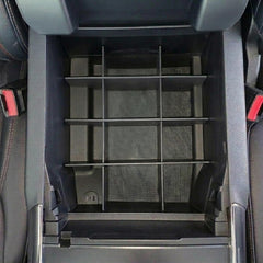 Vehicle OCD upper tray compatibility shot showing SLX169 fits with OEM tray