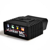 Vgate vLinker MC front view showing compact Bluetooth OBD2 adapter and port access