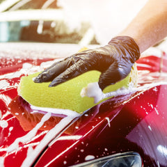 Yaomiao sponge held in hand showing ideal size for precise detailing