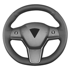 Yeolpise front view installed on Tesla steering wheel showing clean OEM-like fit and improved grip