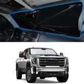 YYCKE front view of sun shade fitted to GMC Sierra windshield, blocks heat