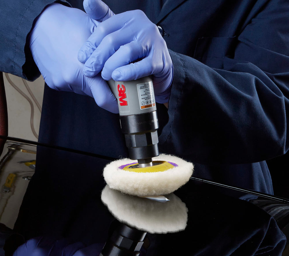 3M Perfect-It pad in use on car door edge demonstrating precise access and control