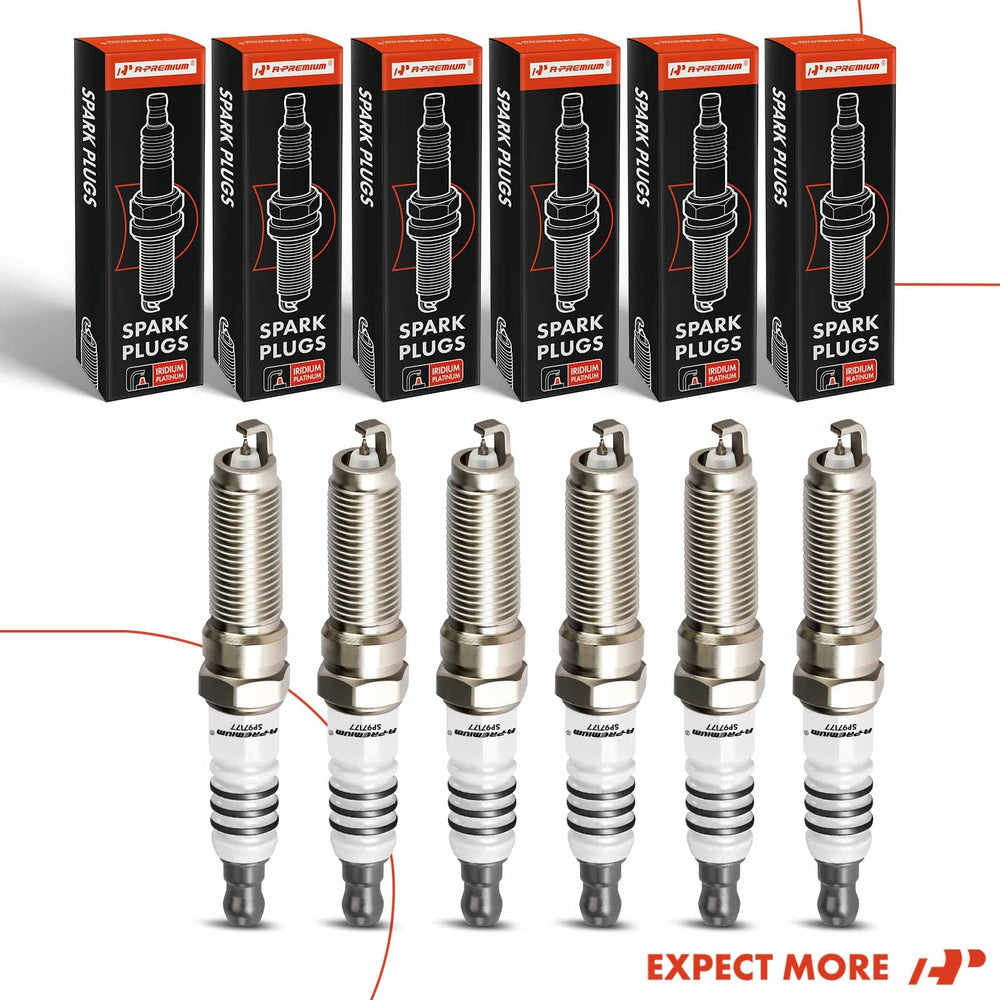 A-Premium plug being installed in a garage illustrating DIY tune-up benefit