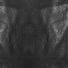 A.A underbelly close-up of woven HDPE and LDPE coating illustrating durable waterproof barrier