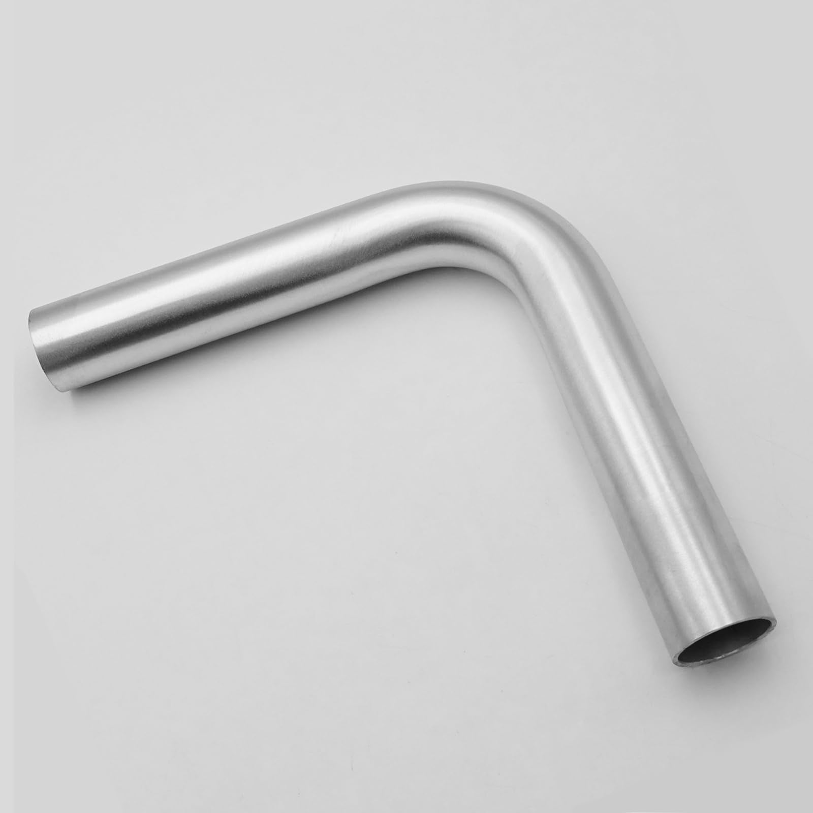 AC PERFORMANCE front-angle view showing elbow shape and polished finish for easy routing