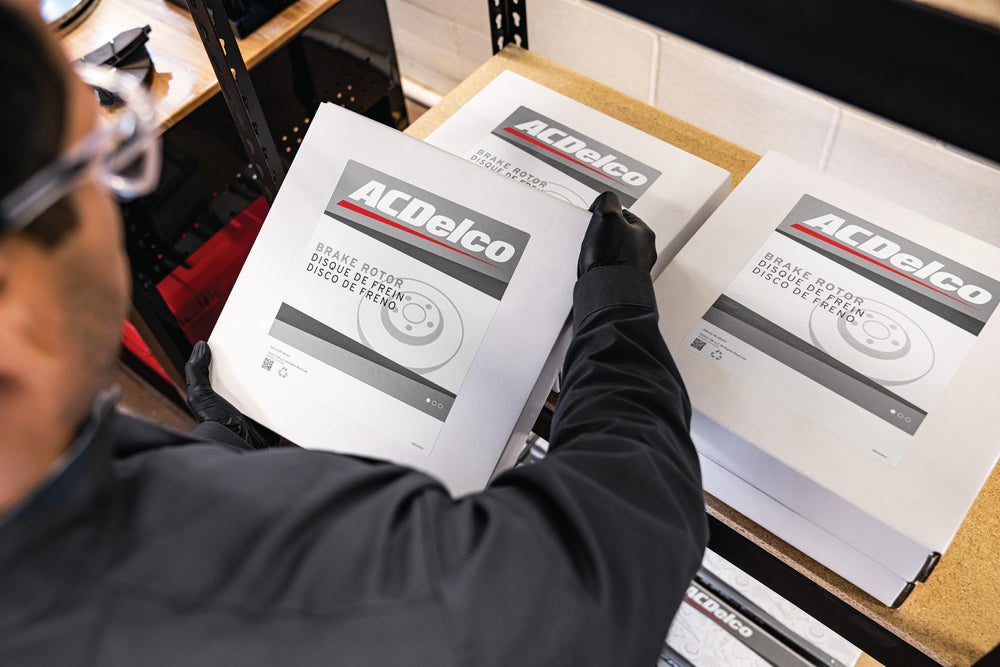 ACDelco rotor mounted on wheel hub demonstrating direct-fit installation benefit