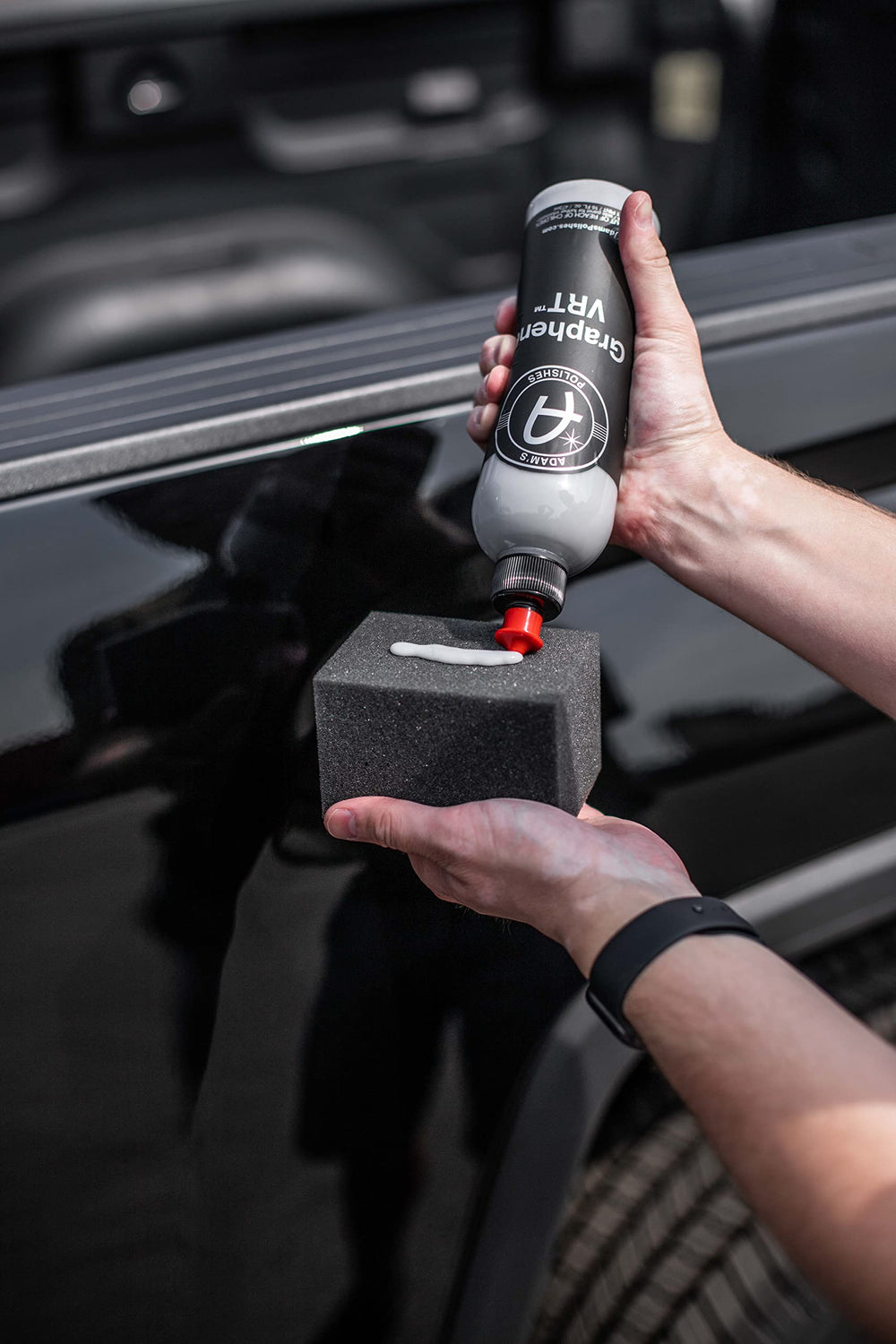 Adam's Polishes in a detailing setup with towels and applicator showing professional results benefit