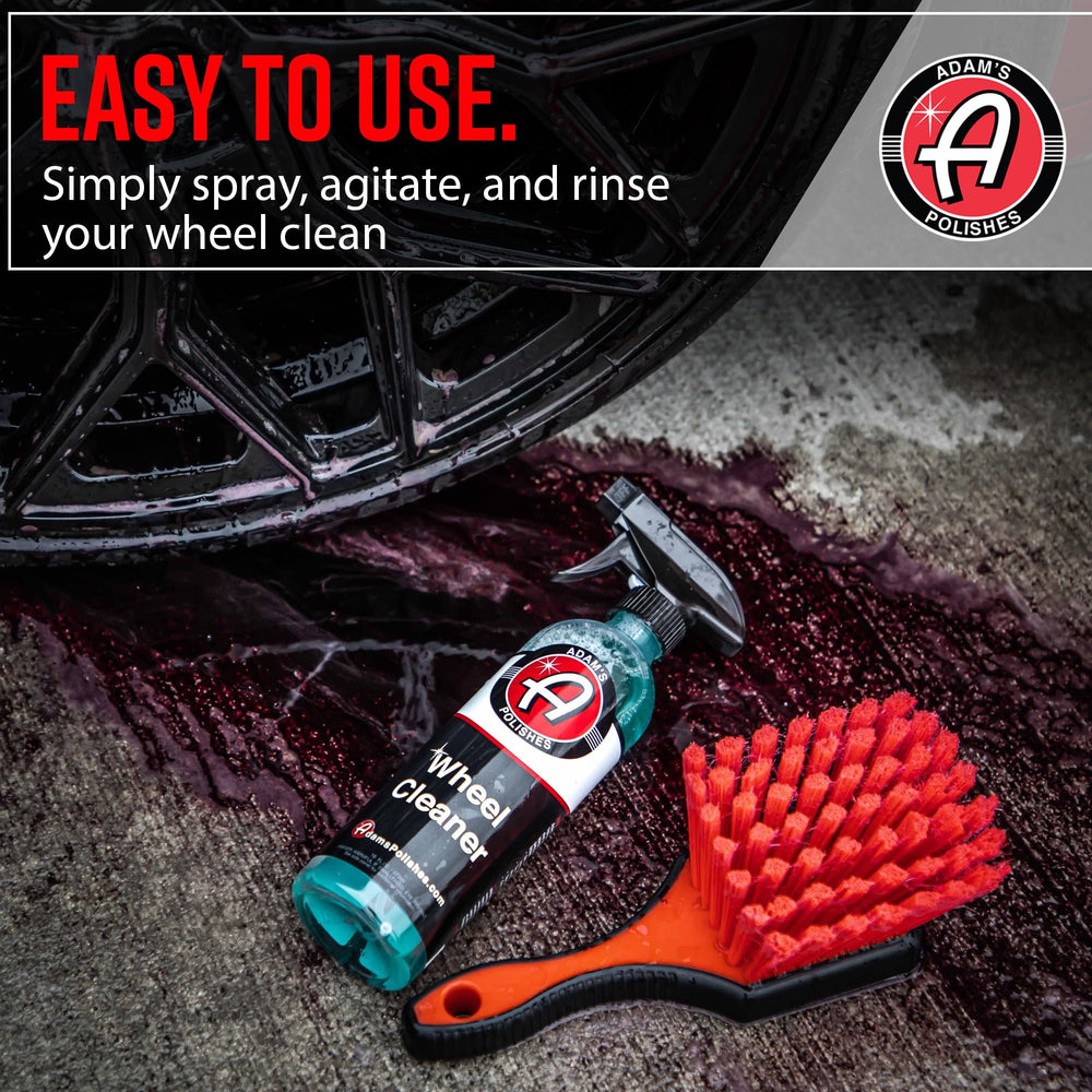 Adam's Polishes bottle next to wheel for scale and application clarity