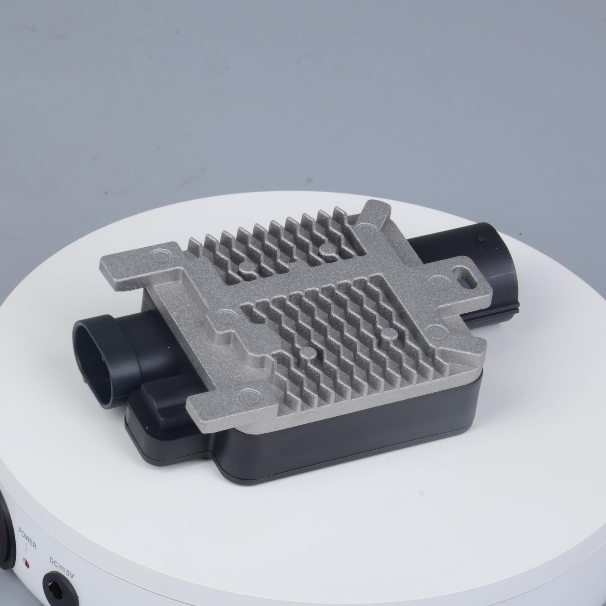 AdvanEX installed near radiator in lifestyle setting showing cooling benefit