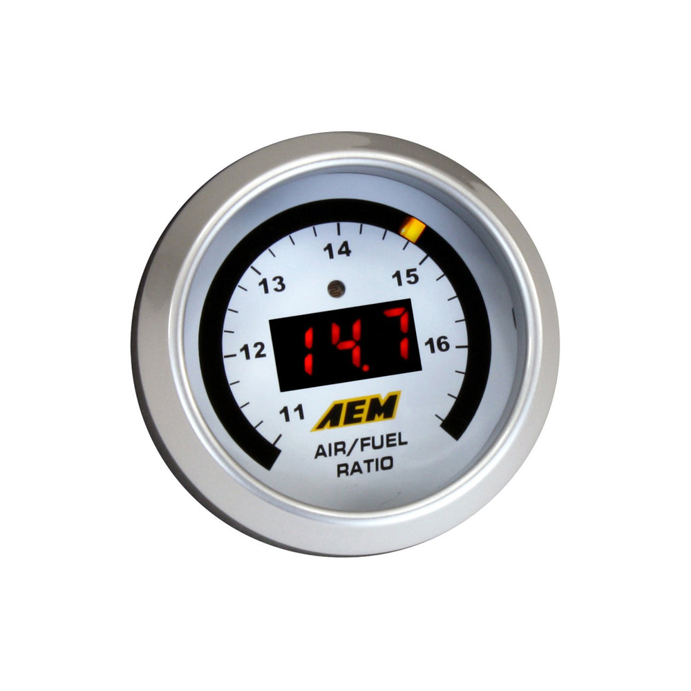 AEM gauge beside a ruler showing 52mm housing, compact fit for most pods