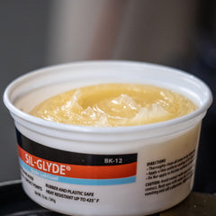 AGS SIL-Glyde silicone paste close-up texture showing smooth, durable consistency