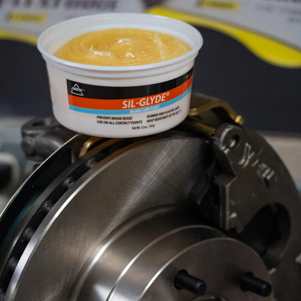 AGS SIL-Glyde tub open with visible paste demonstrating easy access and application