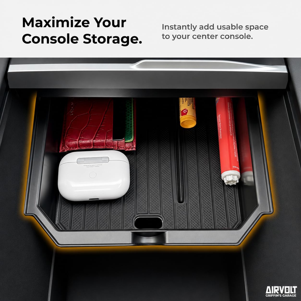 AIRVOLT lifestyle shot inside Tesla with driver enjoying organized cabin