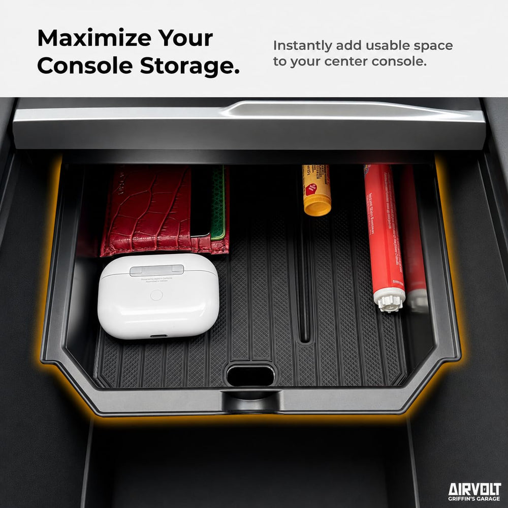 AIRVOLT lifestyle shot inside Tesla with driver enjoying organized cabin