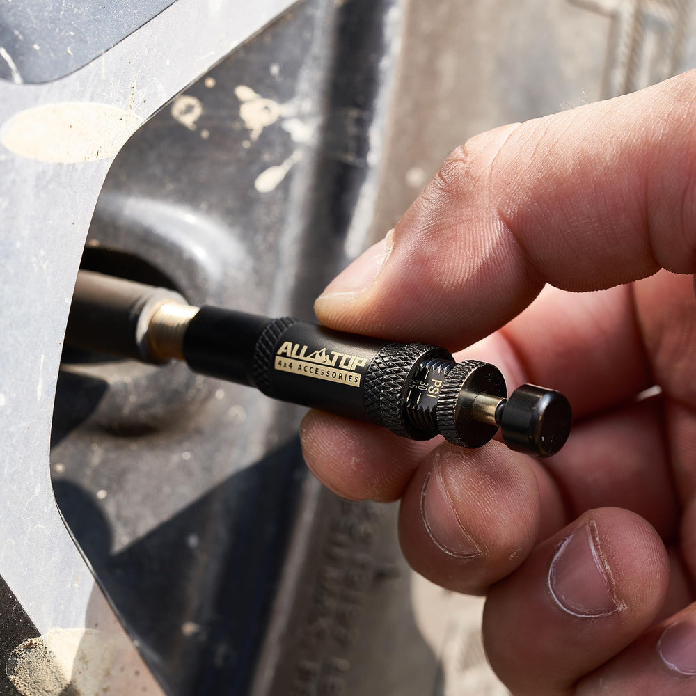ALL-TOP scale beside tire gauge for comparison verifying consistent stop