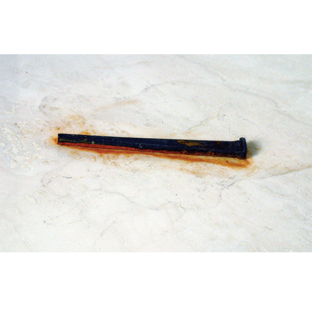 Alpha Professional Tools gel applied to rust-stained brick, demonstrating effective clinging and lifting