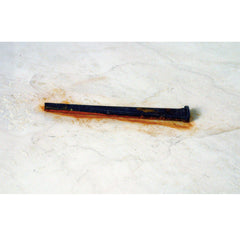 Alpha Professional Tools gel applied to rust-stained brick, demonstrating effective clinging and lifting