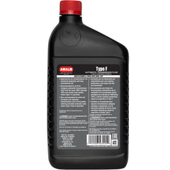 Amalie fluid being poured into transmission pan showing precise refill benefit