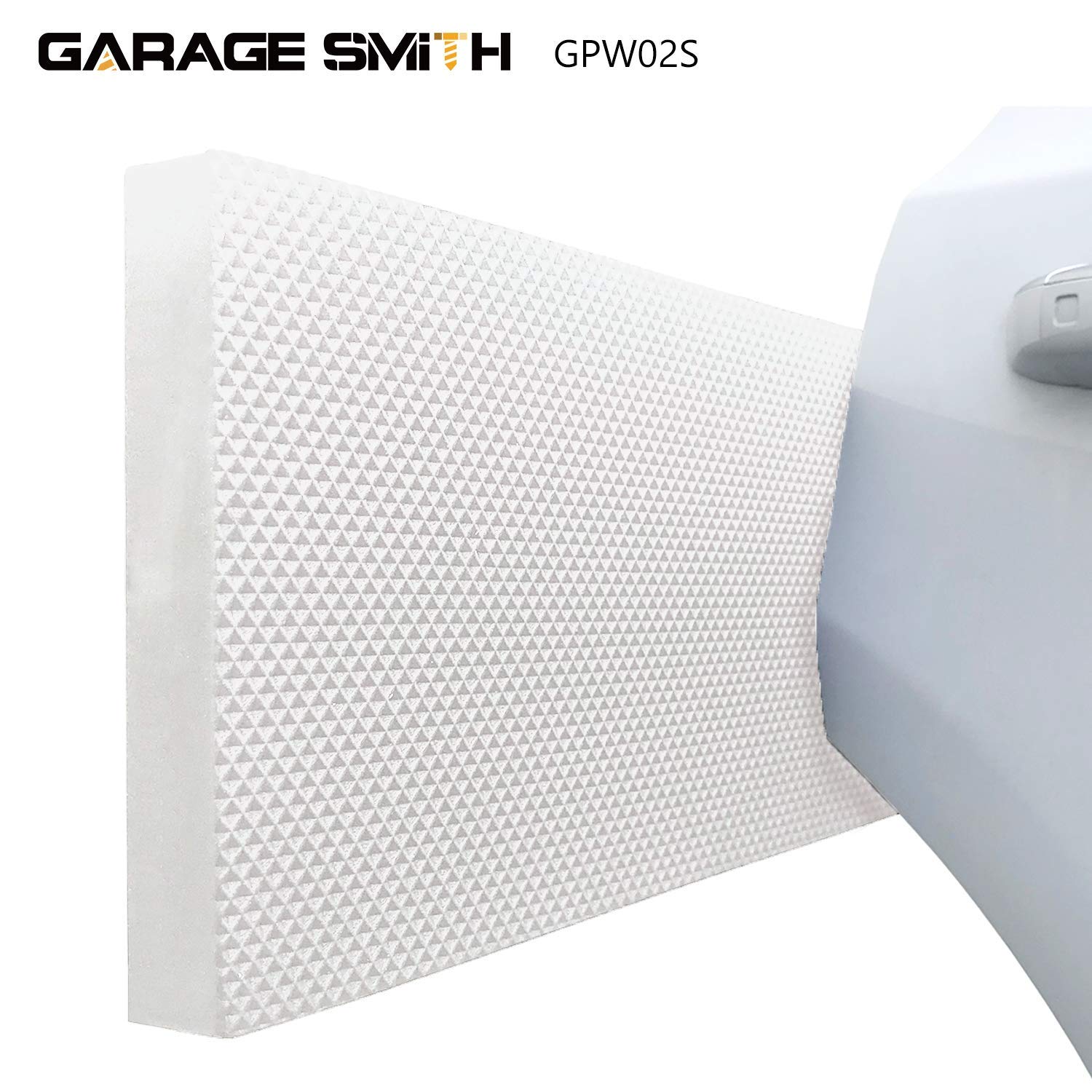 AMPULLA protector installed on garage wall preventing door damage