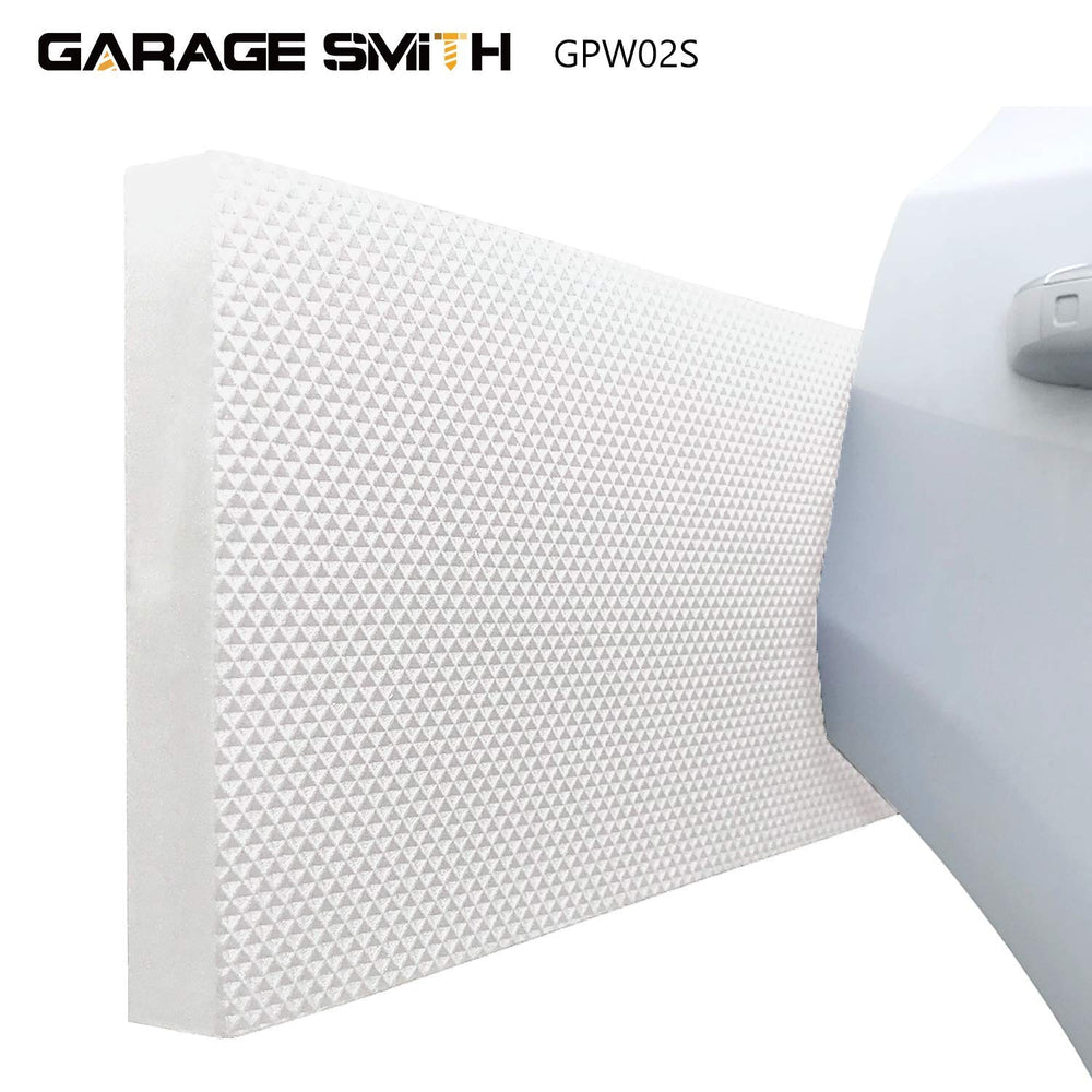 AMPULLA protector installed on garage wall preventing door damage